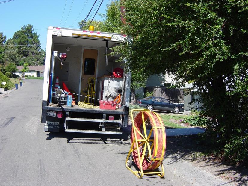 Inspection van with cable reel at a job